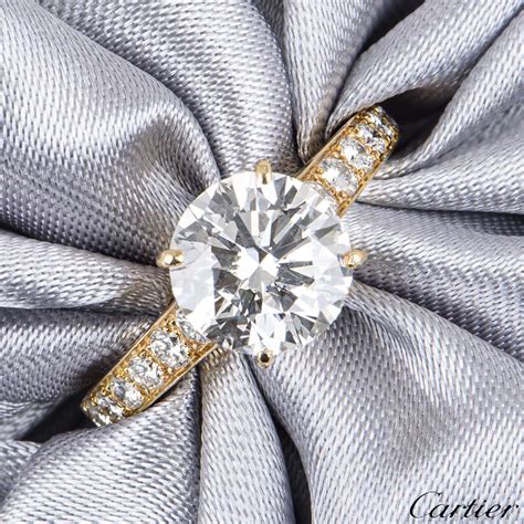 cartier diamond solitaire ring.